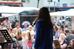 woman speaking to a crowd