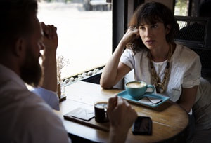 woman and man talking in a restaurant