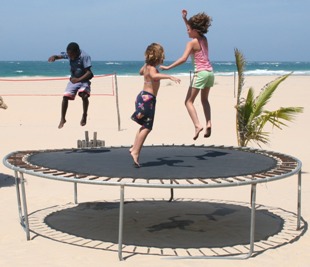 Kids jumping on a trampoline